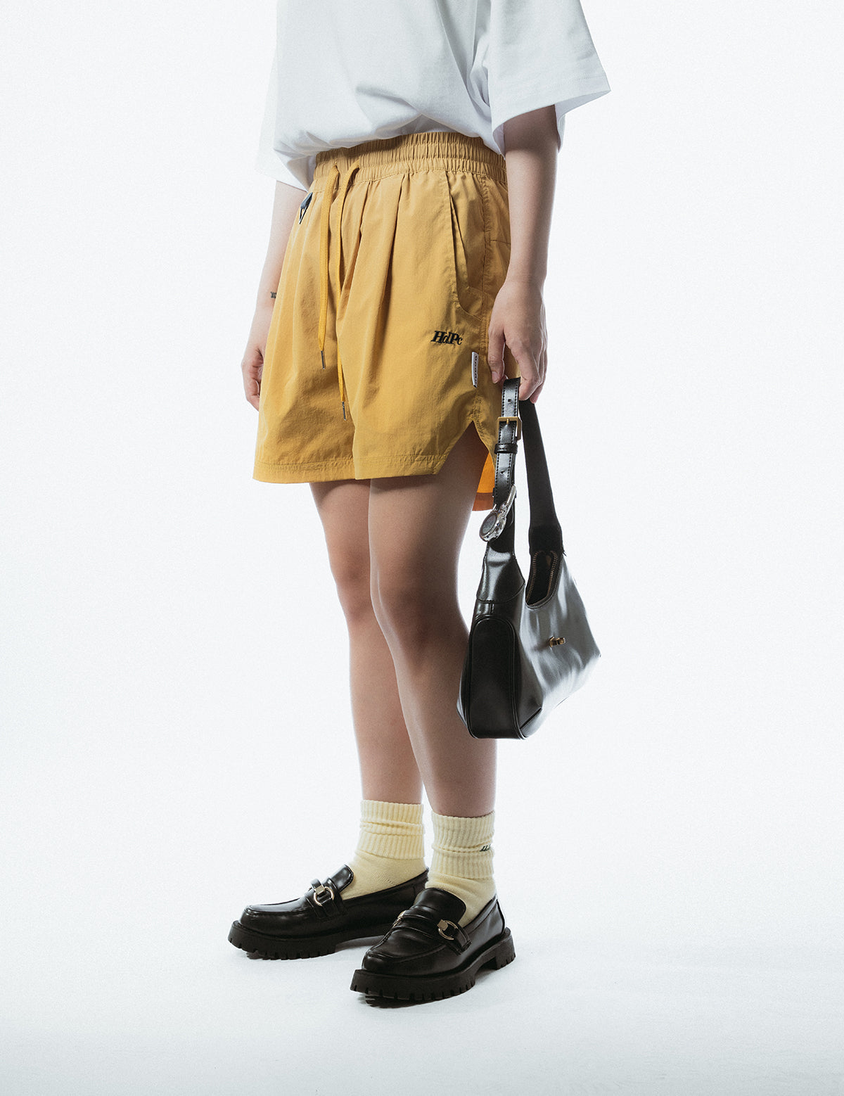 RELAXED FUNCTIONAL SHORTS YELLOW