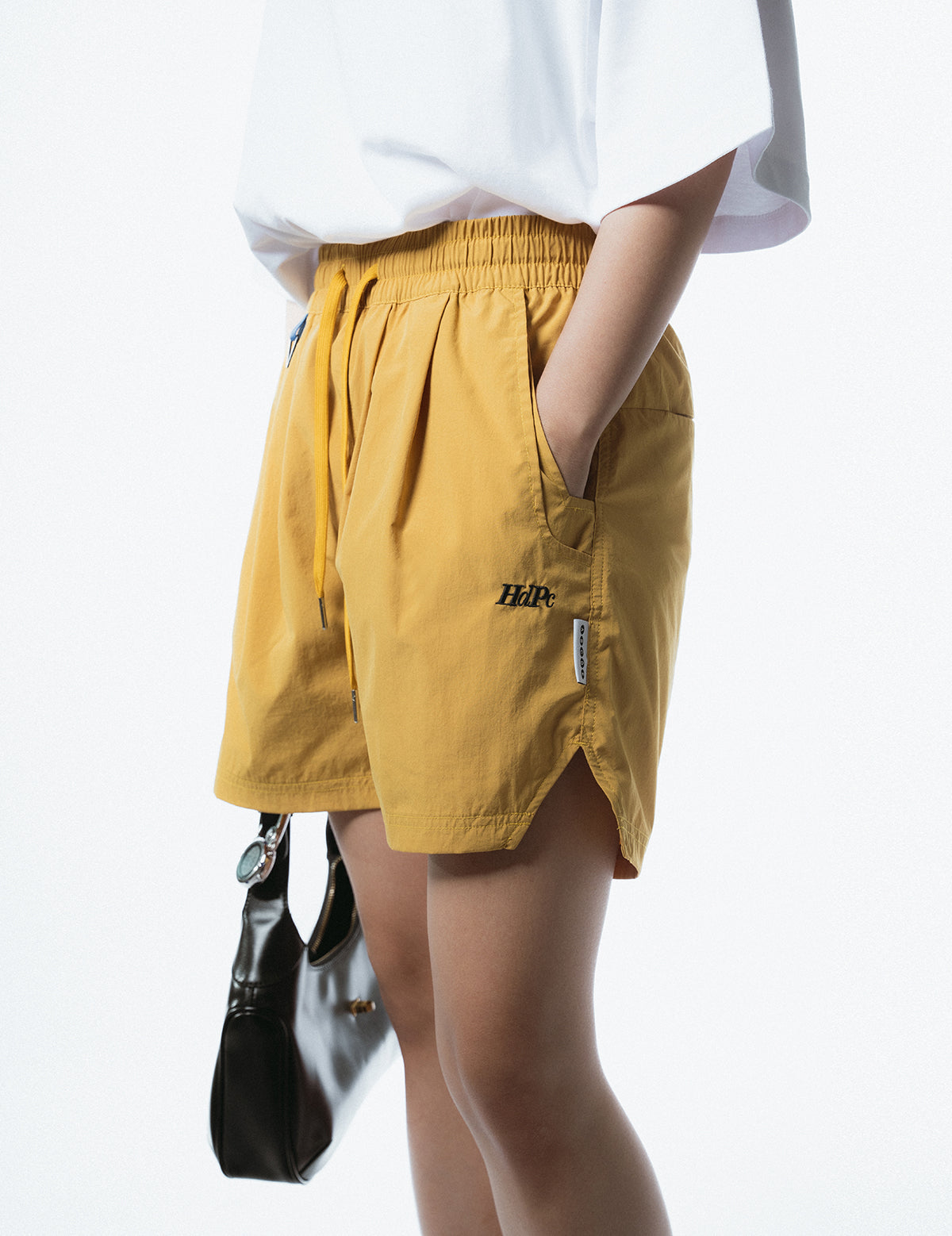 RELAXED FUNCTIONAL SHORTS YELLOW